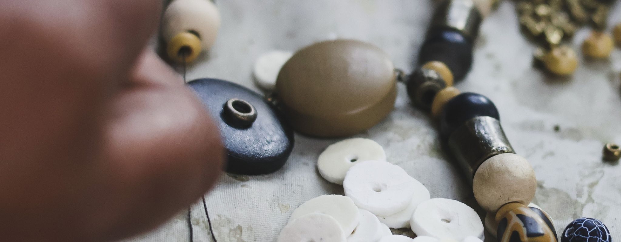 A wide range of natural beads used by skilled artisans for unique jewellery production.