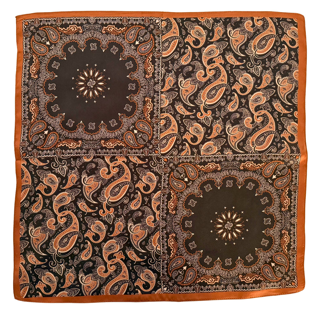 Black and copper silk scarf with paisley and floral design shown in full top view.