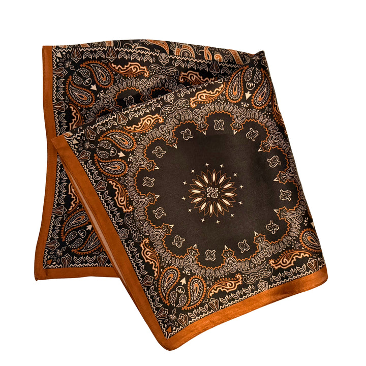 Black and copper silk scarf folded into a square layout showing different angles of the pattern.