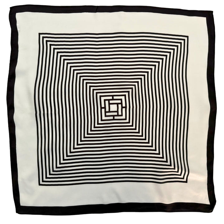 Full top view of a mulberry silk scarf featuring a black and ivory labyrinth geometric design with double border detailing.