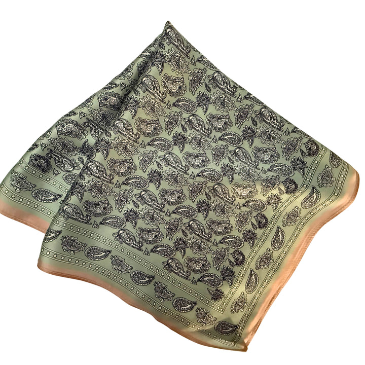 Paisley silk scarf folded into a square layout showing different angles of the pattern.