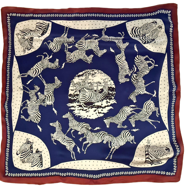 Blue and white zebra silk scarf with copper border shown in full top view.