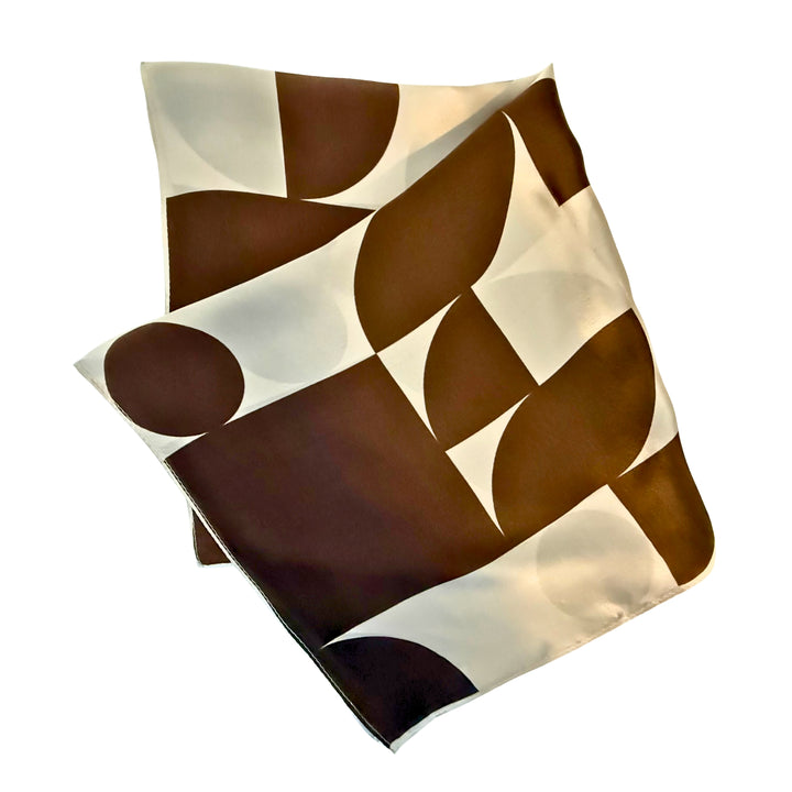 Brown geometric silk scarf folded into a square layout showing different angles of the pattern.