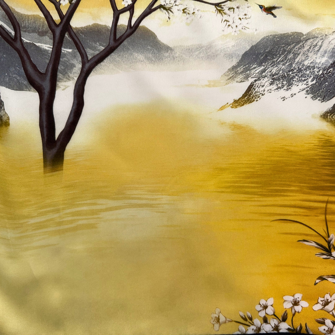 Close-up of the detailed scenic landscape print on smooth 100% mulberry silk fabric.