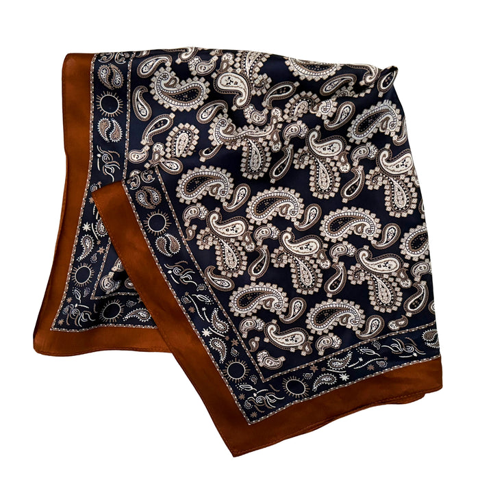 Dark blue paisley silk scarf folded into a square layout showing different angles of the pattern.
