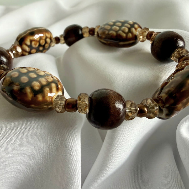 Alternate full view of a handcrafted mixed bead bracelet on elastic cord.