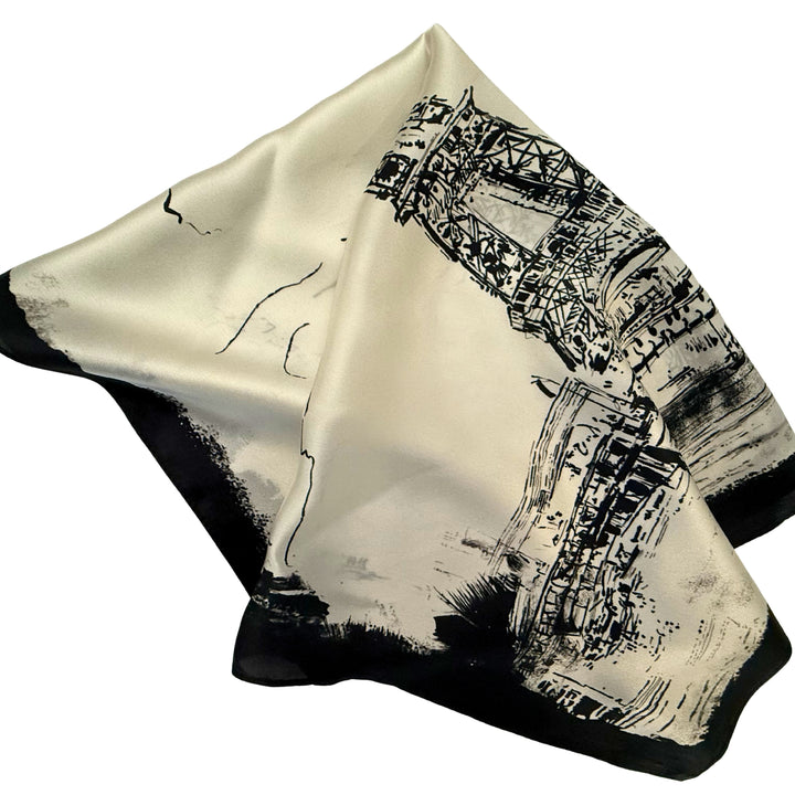 Eiffel Tower silk scarf folded into a square layout showing different angles of the design.