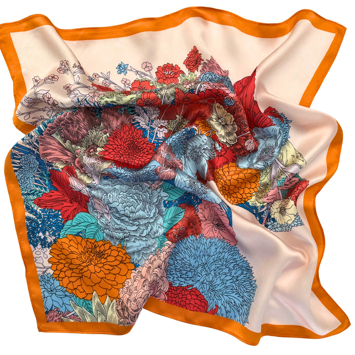 Floral horse silk scarf softly laid out in a relaxed arrangement.