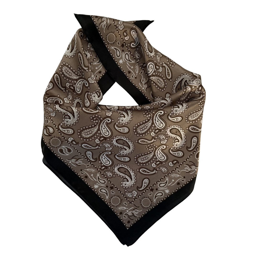 Folded grey beige paisley mulberry silk scarf with black border.