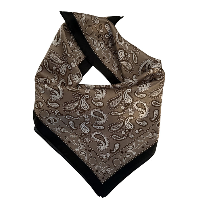 Folded grey beige paisley mulberry silk scarf with black border.