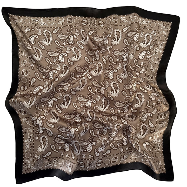 Grey beige paisley silk scarf arranged in a relaxed flat lay.