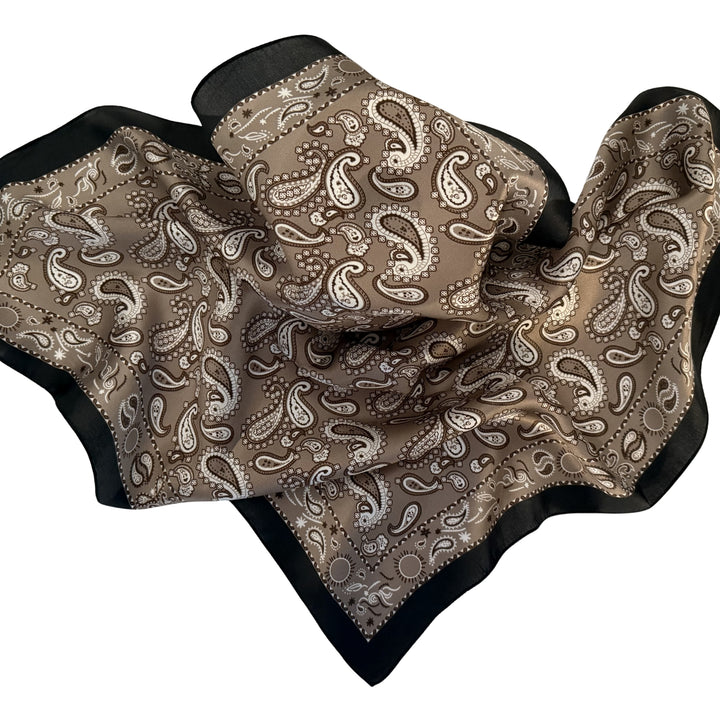 Grey beige paisley mulberry silk scarf loosely spread out.