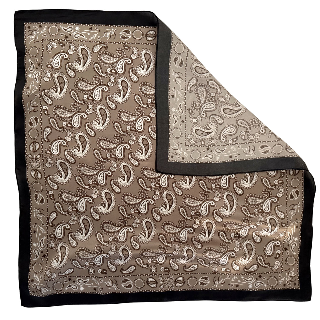 Paisley mulberry silk scarf with folded corner showing the reverse side.