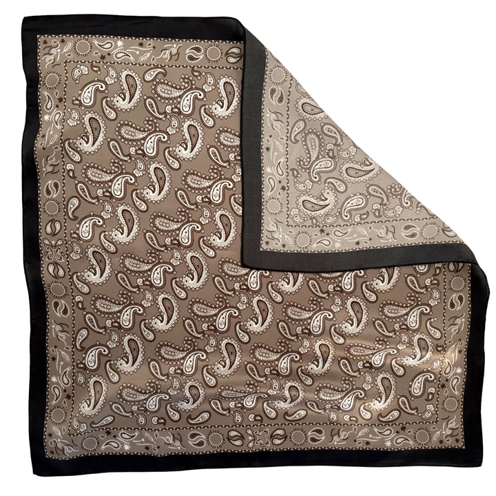 Paisley mulberry silk scarf with folded corner showing the reverse side.