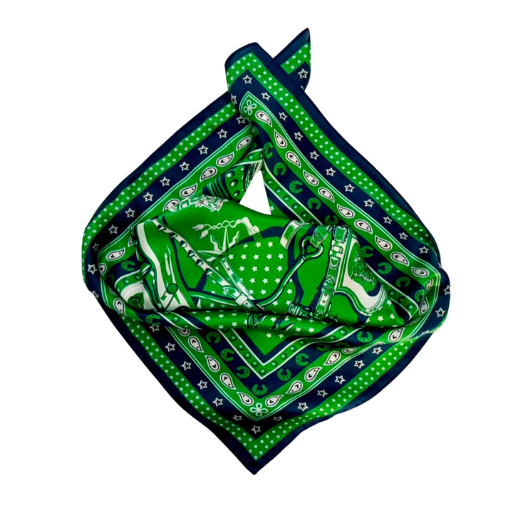 Horse head silk scarf neatly folded showing the detailed horse motif.