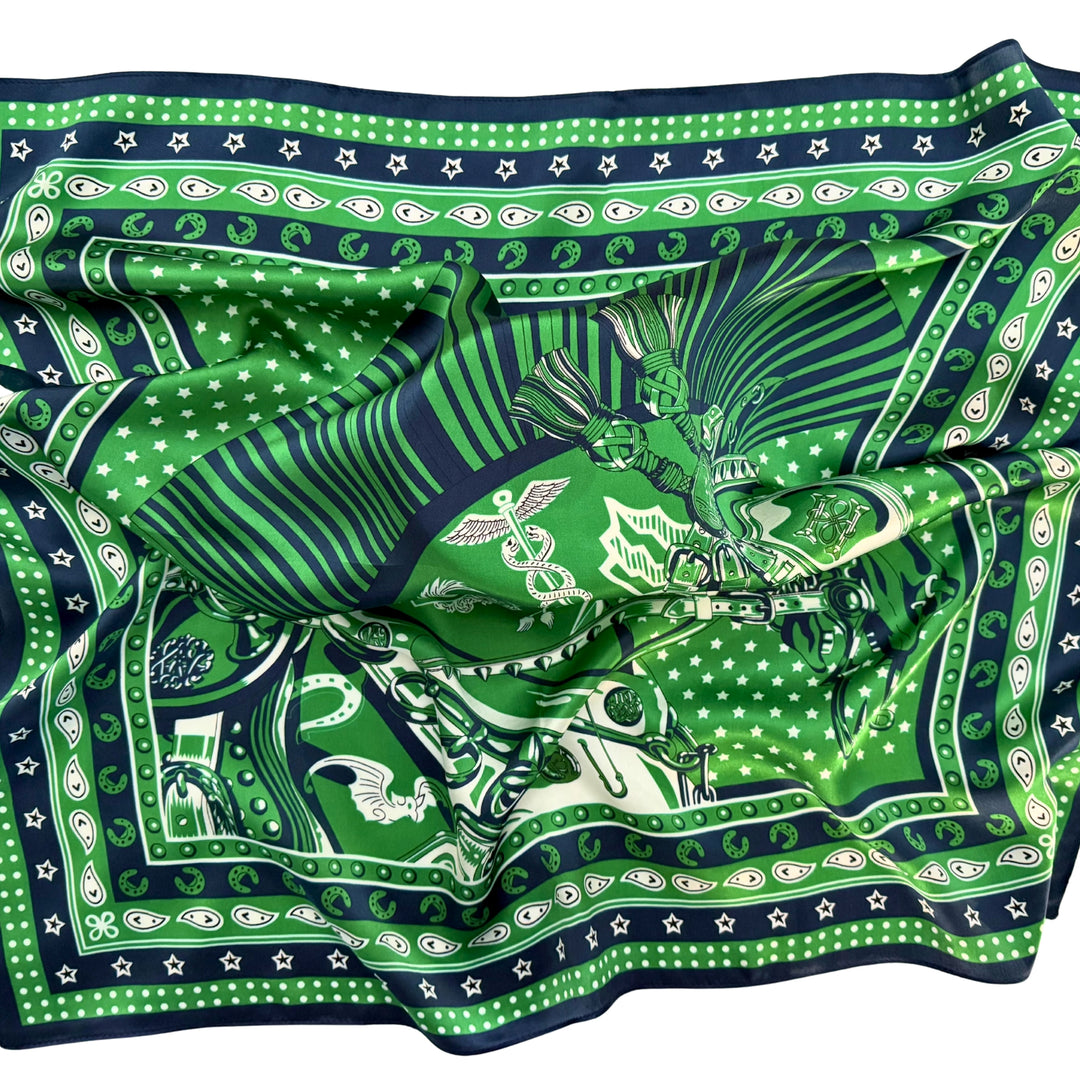 Horse head silk scarf softly laid out in a relaxed arrangement.