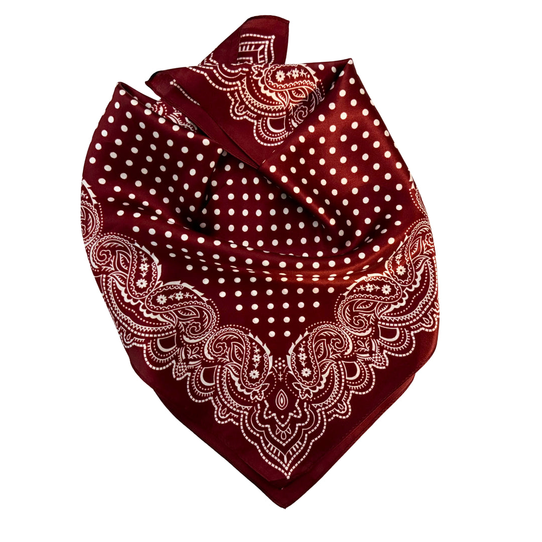 Maroon paisley silk scarf neatly folded showing the border design.