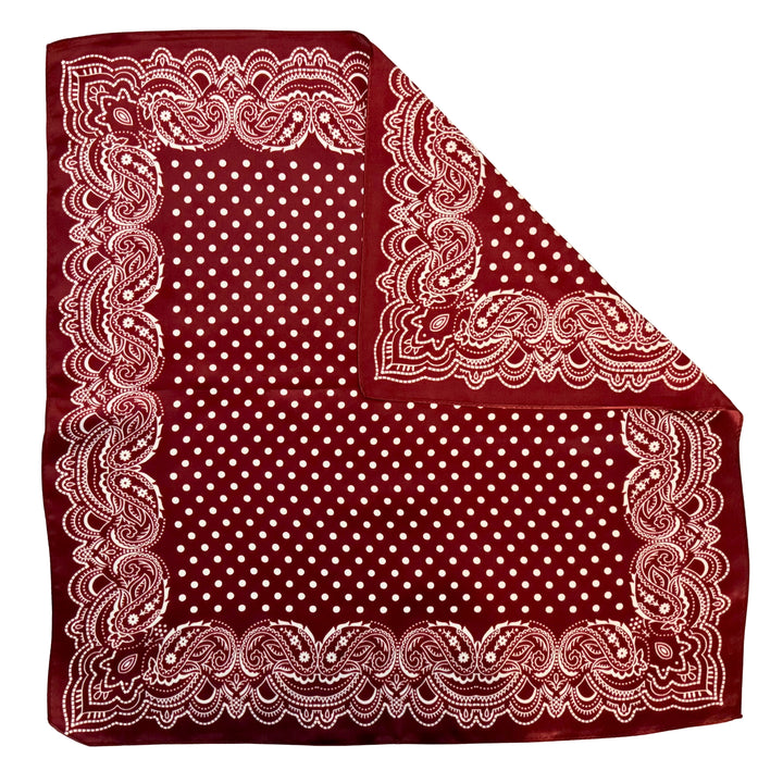 Maroon paisley silk scarf with folded corner showing reverse side and one-sided print.